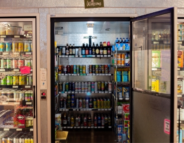 Walk-in beer cave featuring craft beer selections at a Durango Colorado liquor store.