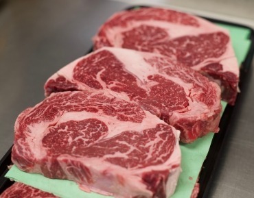 Premium cuts of grass-fed beef and heritage pork on display at Jack's local meat market in Durango.