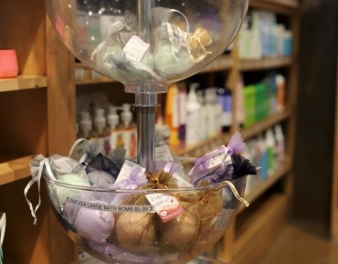 Premium organic skincare lines and natural body care products on display at Nature's Oasis in Durango.