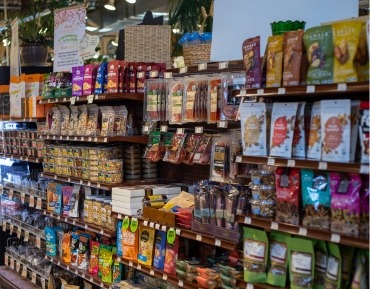 Fresh local artisan products and organic pantry staples on display at the market in Durango.