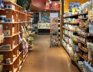 Gluten free special dietary groceries and eco friendly supplies on shelves at the Durango market.